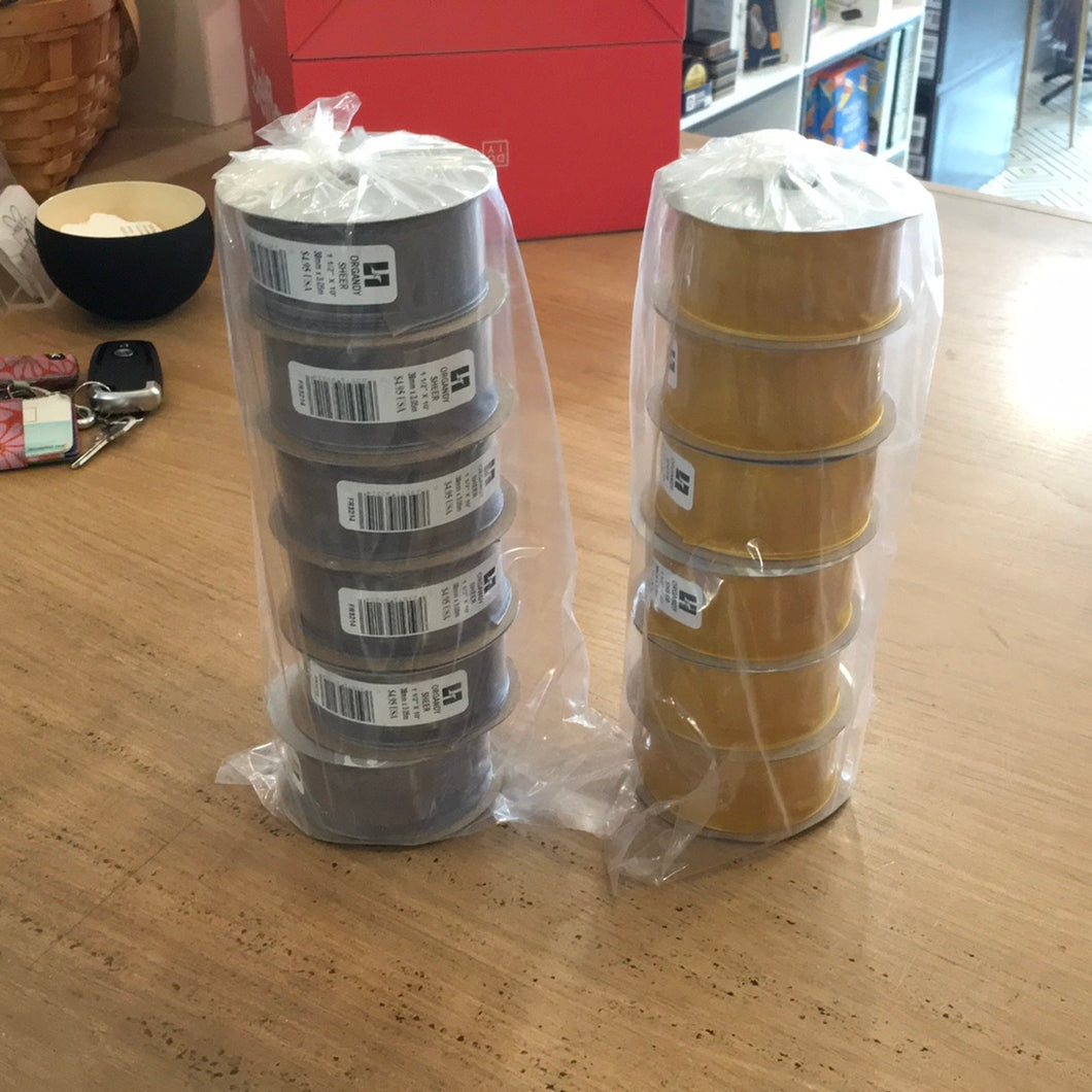 Ribbon above ribbon on wall